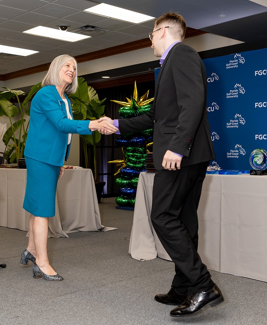 Provost Thorne congratulate awardee at the 29th Celebration of Excellence