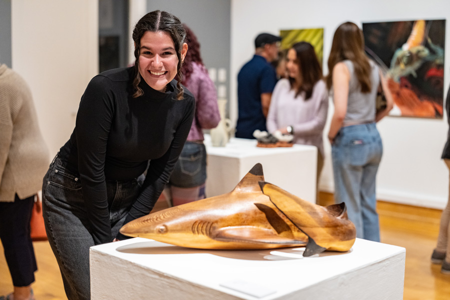 FGCU Art major Kailyn Uria pictured with her sculpture Domino, 2025. Photo by James Greco. FGCU Art major Kailyn Uria pictured with her sculpture Domino, 2025. Photo by James Greco.
