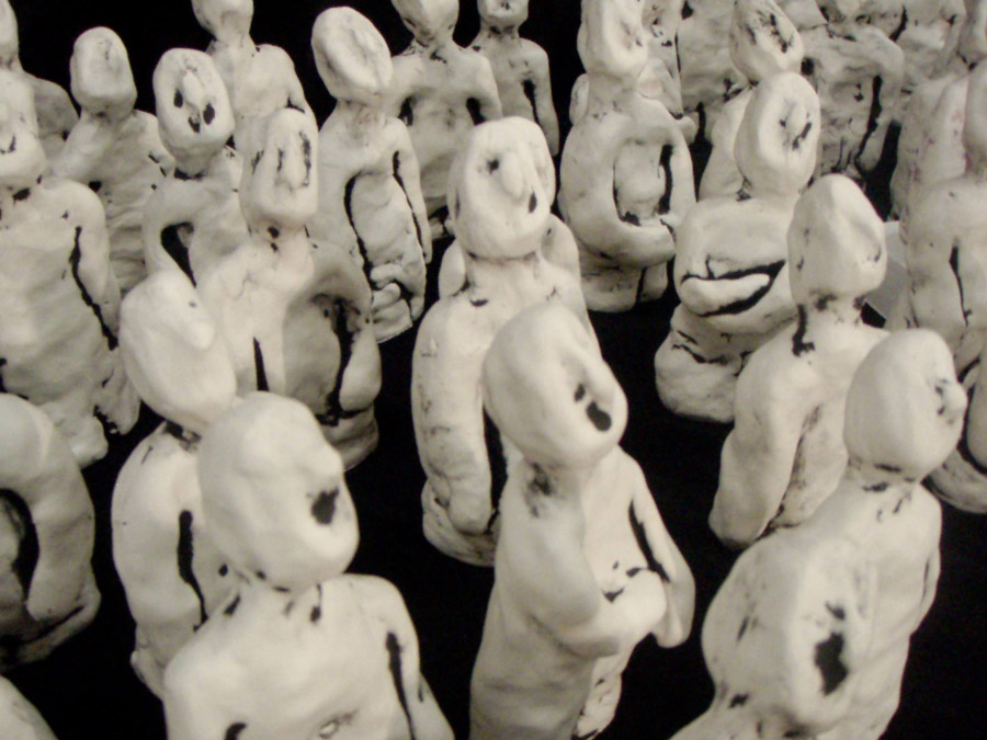 Krista Robbins, Untitled (detail), 2007 Ceramic installation of 100 figures, each approximately 6 x 2 x 3 in.