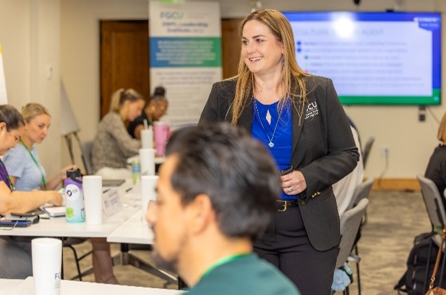 Jenny Manegold, Ph.D., Interim Associate Dean and Professor of Management, leads participants through a leadership development workshop.