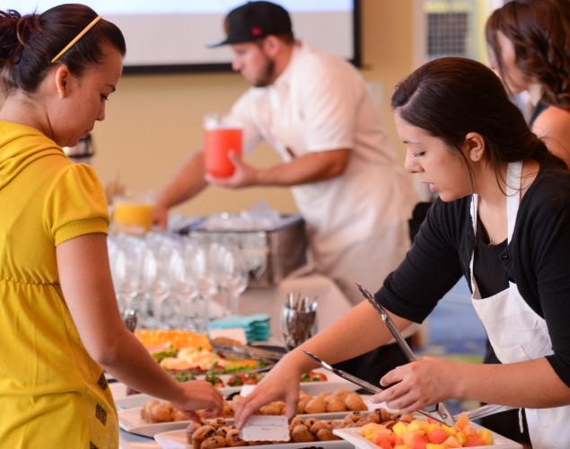 Hospitality students plating food