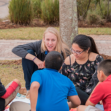 FGCU students teaching young children