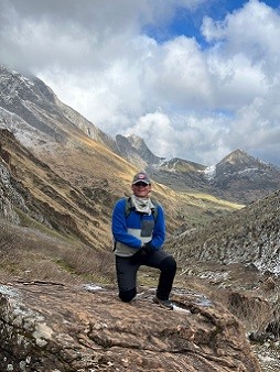 Sebastian Aspron Sebastian Aspron posing in front of a rocky mountain range