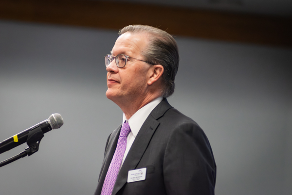 Mr. Whitehouse at the podium