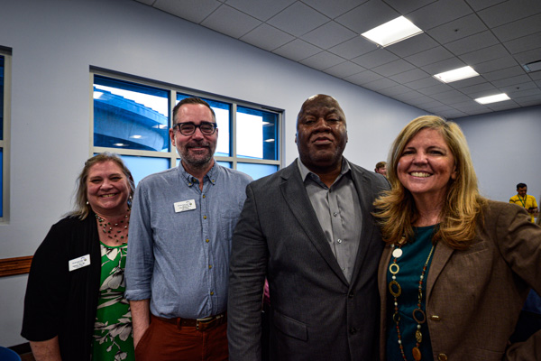 Portrait of four organizers of the summit