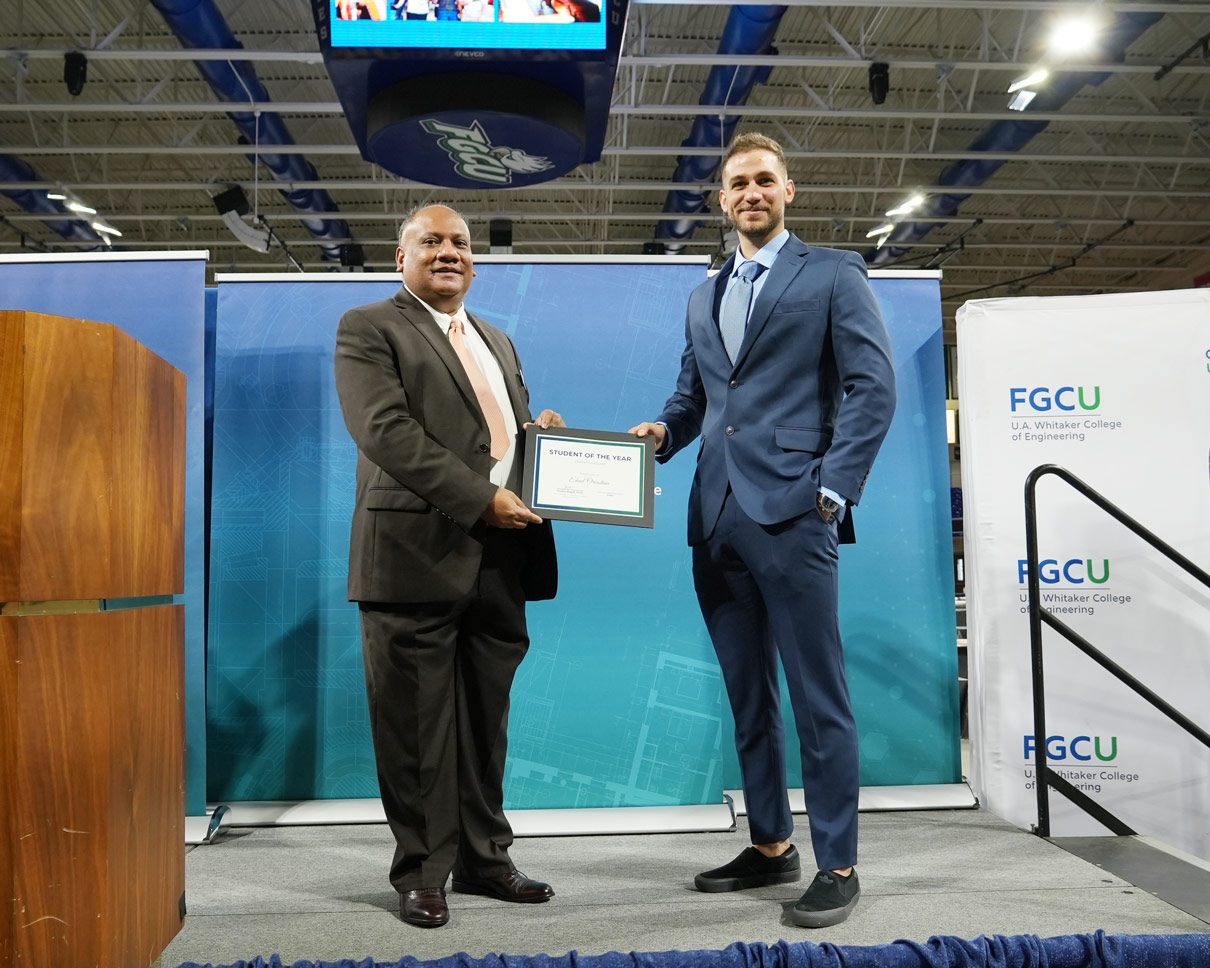 Ehud receives his certificate from Dr. Kagdi