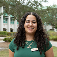Headshot of Thalia Mora