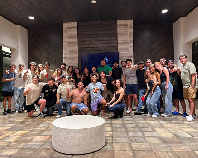 A large group of students from SOAR smiling and posing.