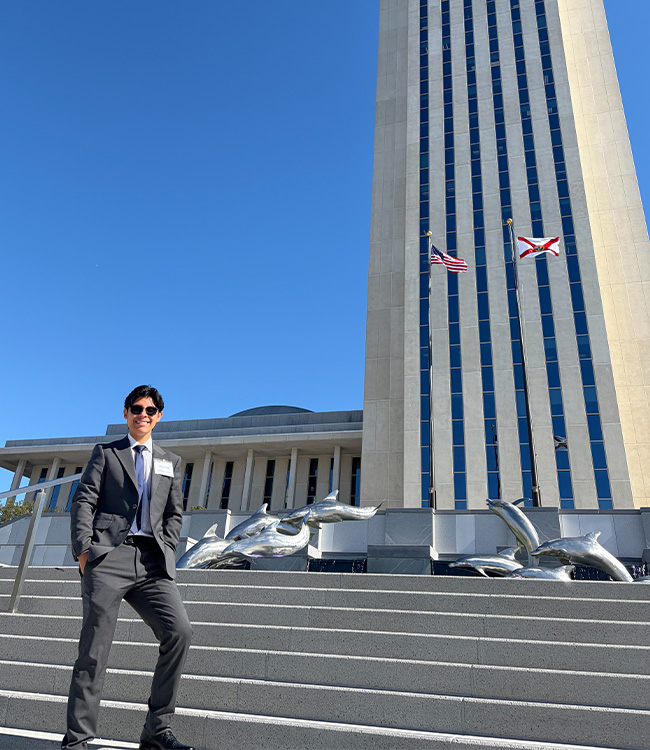 Juan Cortes stands on the steps of the Florida Capital