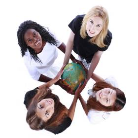 4 females holding a globe map