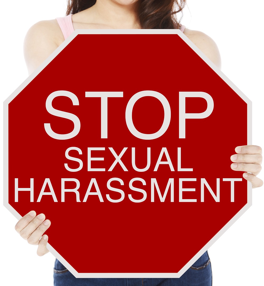Stop sign that reads Stop Sexual Harassment