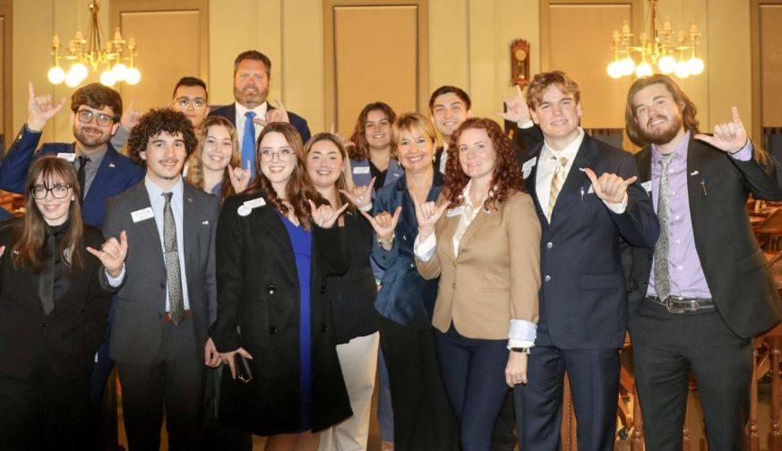 Senator Martin and President Timur with students participating in FGCU Day at the Capitol at the President's Welcome Reception at the Florida Historic Capitol