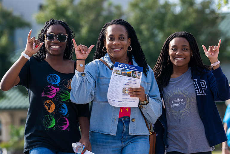 Students and parent doing wingsup