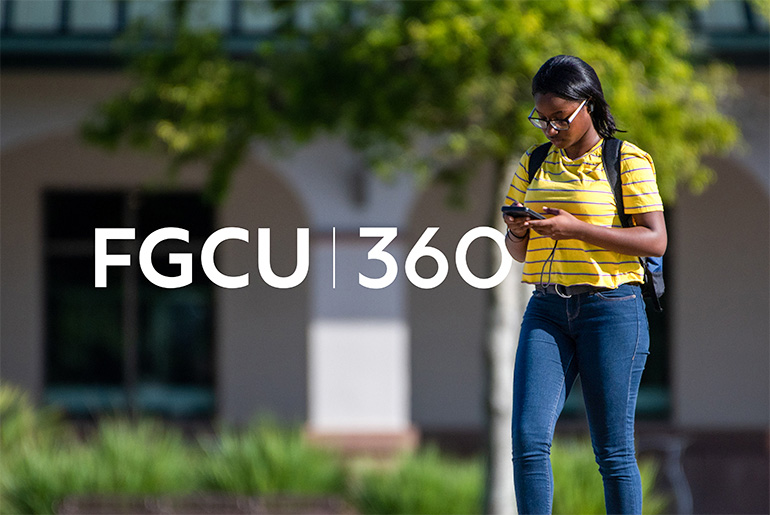 FGCU student reading FGCU360 on her phone