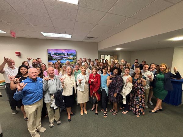 adjunct-workspace-reception-group-photo