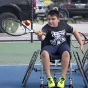Image of child participating in adaptive basketball at Adaptive Sports Day 2024