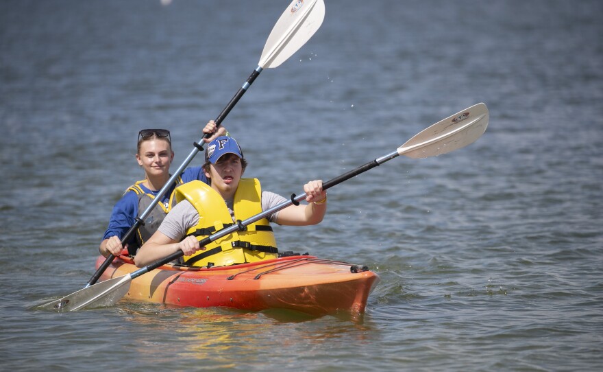 Image of articipant of Adaptive Sports Day participating in Adaptive kayaking at Adaptive Sports Day 2024