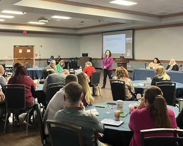 Holly Brown presenting at mental health seminar