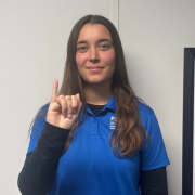 FGCU GIDDI Staff signing I Make a fist, but extend your pinky finger straight up.