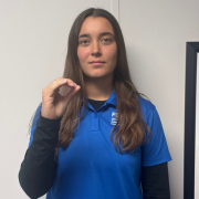 Image of FGCU GIDDI employee singing O Curve all your fingers and your thumb to form an "O" shape (all fingertips touching the thumb).