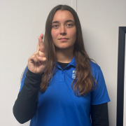 Image of FGCU GIDDI Staff signing R Cross your middle finger over the back of your index finger. Curl the rest of your fingers down.