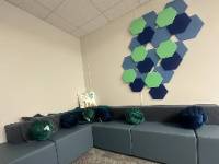 Image of The Nesting Place couches with pillows and wall decor