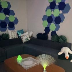 Image of The Nesting Place Study area that features weighted blankets and varied low lighting