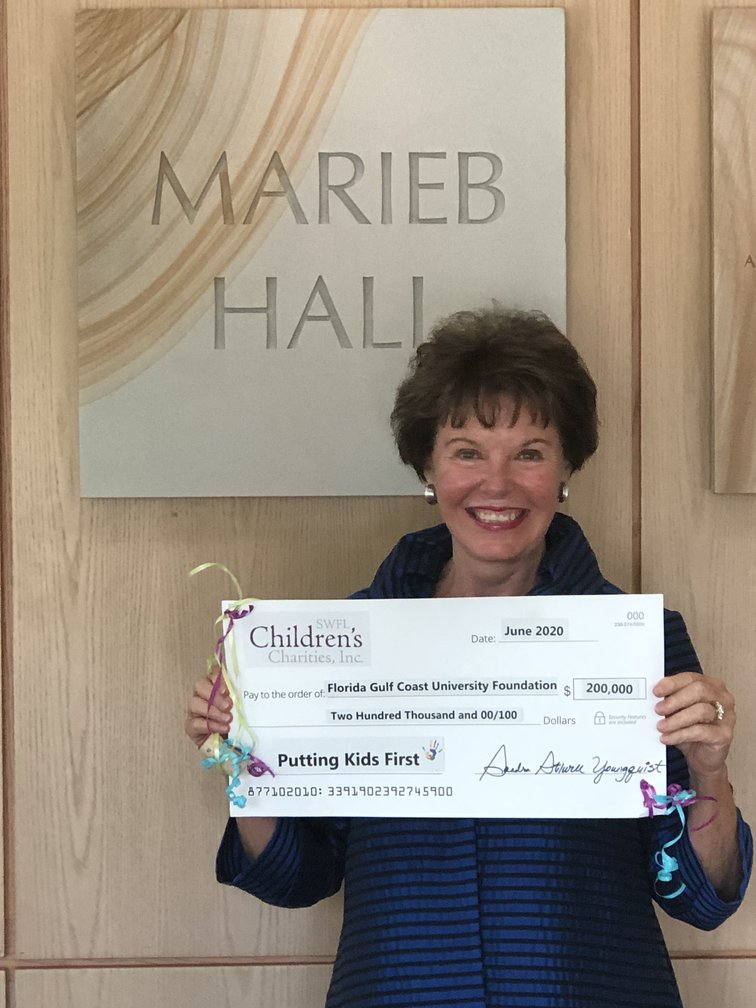 Dean Ann Cary accepts with gratitude the Foundation funding from SWFL Children's Charities 