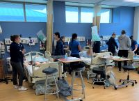 Nursing students & Therapy Grads Collab for Foundations Lab 