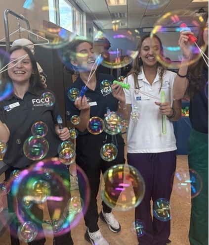 OT Student Blowing Bubbles