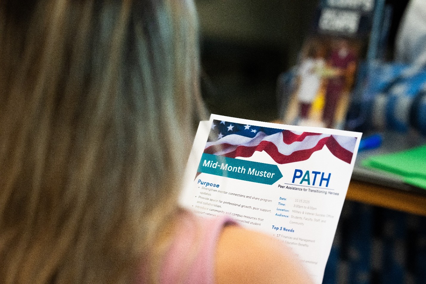 Lady holding paperwork of PATH