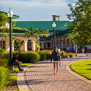 A student walks near Howard Hall