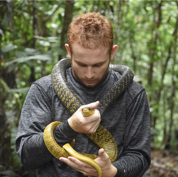 Alexander Marsh with snake in Peru