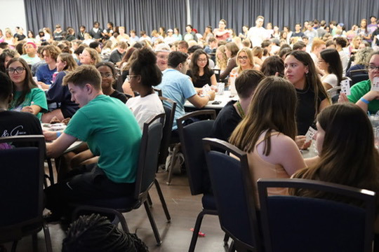 Picture of large number of students playing Bingo in Cohen Ballroom