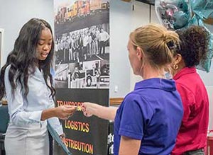 Student interviewing with possible employer at the FGCU Career Fair