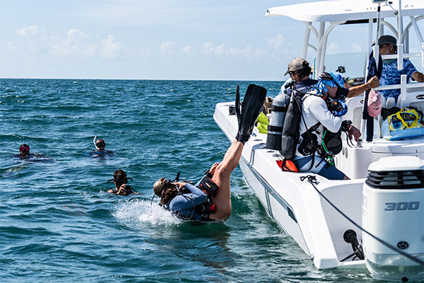 Students diving at Kimberly's reef