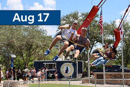people riding on swing ride event date August 17