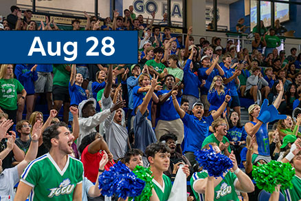 people cheering at volleyball game event date August 28